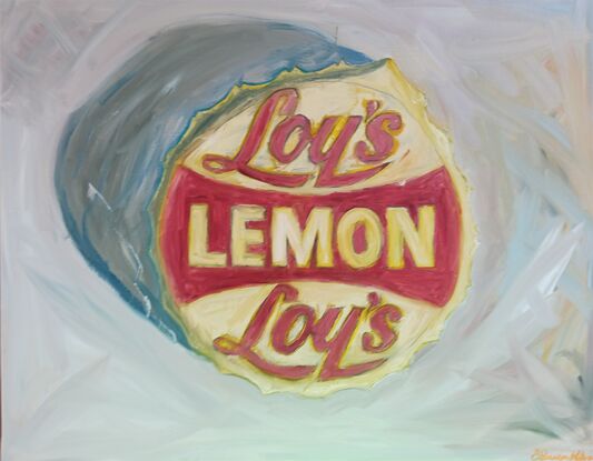 Loy's bottle top on back ground.