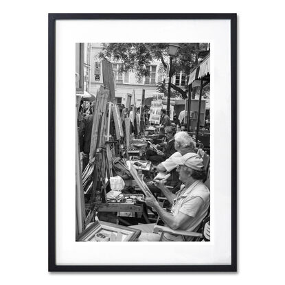 Black and white photograph of wedding couple dancing in street, Paris, France