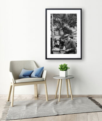 Black and white photograph of wedding couple dancing in street, Paris, France