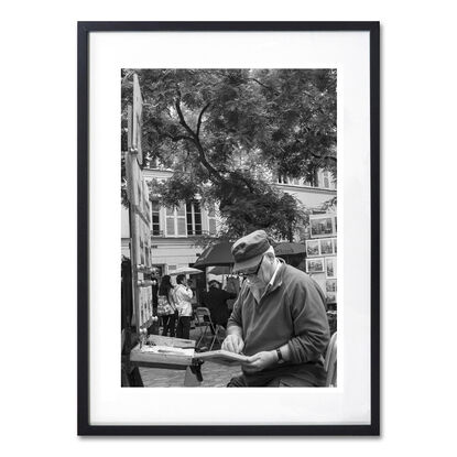 Black and white photograph of wedding couple dancing in street, Paris, France