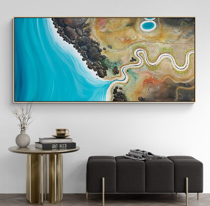 Way Back When, a textured aerial landscape painting features a vivid blue ocean on the left, with rugged brown boulders along the foreshore. A river winds through an earthy, neutral-toned landscape, joining the ocean and creating a harmonious, dynamic composition.