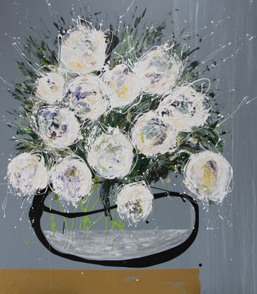 Large white abstract flowers in an organic black vase, sitting on a gold shelf.  Medium grey background.  A largescale statement piece with natural tones.