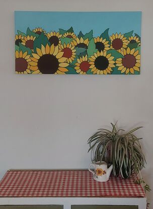 A close up of sunflowers in the sunshine. 