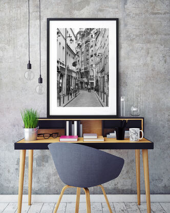 Black and white photograph of wedding couple dancing in street, Paris, France