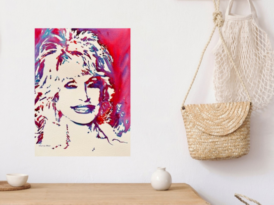 "Radiant Smile" by Christine Beard is a dynamic watercolor portrait that captures the essence of Dolly Parton with a bold and colorful abstract approach. The vibrant hues and loose brushstrokes highlight the iconic features and joyful energy of the beloved music legend. This contemporary piece not only celebrates Dolly's radiant smile but also embodies the spirit and charm that have made her a cultural icon. Perfect for fans of country music and pop art alike, this artwork is a striking addition to any collection.





