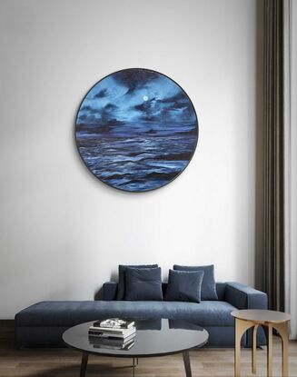 In this evocative acrylic painting, a full moon bathes the sea in a tranquil, blue glow. The scene unfolds on a canvas awash with varying shades of blue, capturing the moon’s radiant light as it reflects gently upon the calm, rippling waters. The moon itself, a luminous orb of soft blues, dominates the night sky, casting an ethereal glow that merges seamlessly with the tranquil seascape below. The artist’s brushwork brings out a subtle texture in the water, enhancing the interplay of light and shadow. The composition exudes a serene, contemplative mood, inviting viewers to lose themselves in the quiet beauty of the moonlit sea.