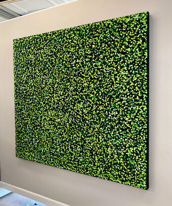 thousands of green dots on black canvas