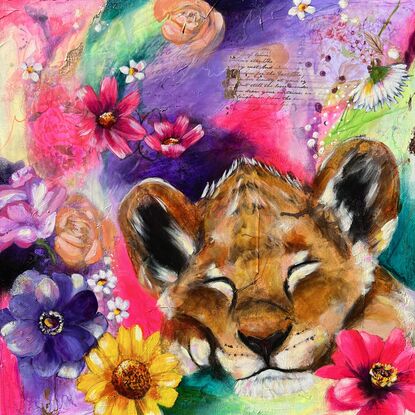 Lion cub sleeping with lots of colours and textures around the cub. Florals surround the flowers. 