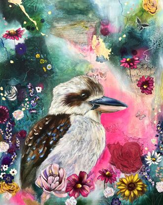 Kookaburra with a pink glow behind it. Florals around the base and side of the kookaburra. Green abstract background. 