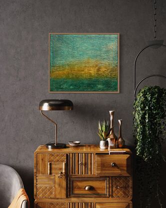 A textured abstract in landscape orientation that features ochre, gold and teal blue and represents a tropical sunset.