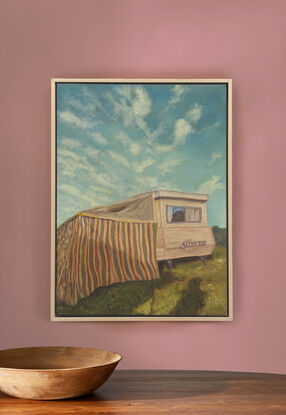 The old 80's trailmate caravan with Retro Annex, sitting on a hill on a sunny day.