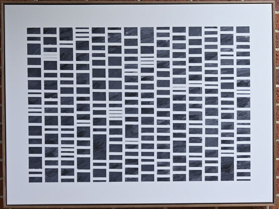 A grid of rectangles of different sizes formed in textured modelling paste with acrylic paint (black/slate) set against a neutral background of off white.