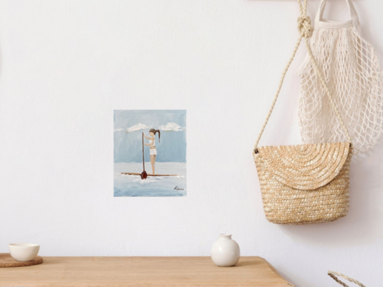 Coastal figurative painting featuring a girl on her paddle board.