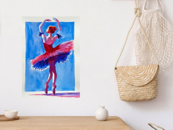 "Grace in Motion" by Christine Beard is a captivating watercolor artwork that celebrates the elegance and poise of a ballerina. The painting features a dancer in an exquisite pose, her form accentuated by the vibrant contrast of rich reds and deep blues. The fluidity of her movement is beautifully captured in the flowing lines of her tutu, highlighting the grace and strength required in ballet. This piece is a stunning tribute to the art of dance, offering viewers a glimpse into the world of classical ballet with a contemporary artistic twist. Perfect for lovers of performing arts and collectors of dynamic, expressive art.




