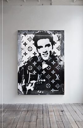 Black and white Elvis sitting smiling with guitar LV Louis Vuitton background