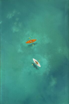 Bright orange and white kayaks on turquoise water