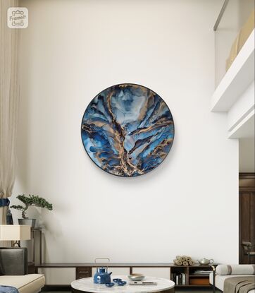 This abstract painting makes a statement with its dramatic form and soft tones. Highlighted with brass golden elements that capture the light to bring class to a modern room. 