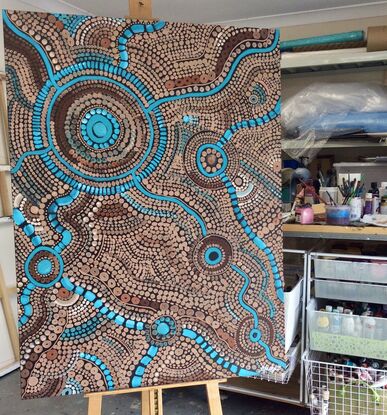 Aboriginal artwork depicting  the rivers and waterholes of my Country and their movement - the colours depict water, river rocks and stones and the muddy river banks