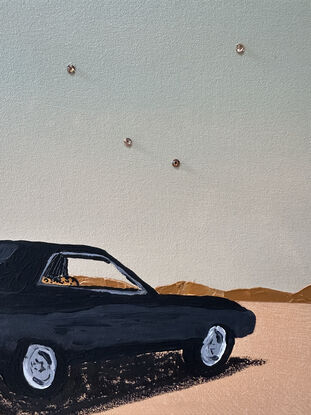 A dusty-coloured desert landscape where there appears to be lifeless black cowboy boots jutting out of a rolled up Persian carpet. Nearby, a feminine figure in a leopard print coat sits inside a 1970 Dodge Charger.