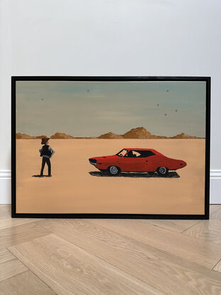 A dusty desert landscape, mountains in the backgound. In the middleground, a cowboy stands with his hands on his hips, facing a red classic car in a standoff position.