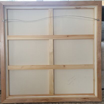 Piano and chair with view through to other rooms. Framed in Tasmanian Oak. 