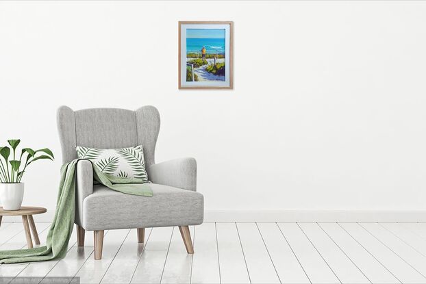 A figure stands overlooking a summer beach and feels good about life