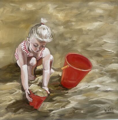 A young blued girl in red and white striped bathers crouches in golden sand playing with two red buckets. Framed in lined white wood.