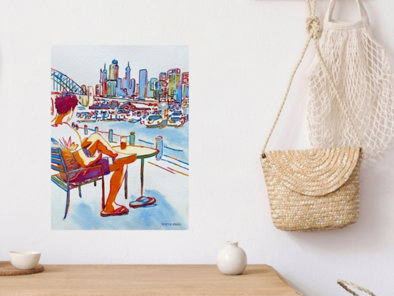 "Relaxed Views at Darling Harbour" by Christine Beard encapsulates a peaceful moment of solitude and contemplation, as a figure leisurely enjoys a drink while taking in the iconic Sydney skyline and the grandeur of the Sydney Harbour Bridge. This watercolor painting beautifully blends vibrant urban architecture with the serenity of waterfront life, offering a vivid portrayal of modern city living. Perfect for lovers of Sydney's urban beauty and those who appreciate the peaceful moments amidst a bustling city, this artwork is a stunning addition to any collection.





