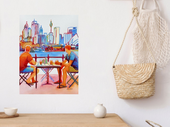 "Sydney Skyline Conversations" by Christine Beard captures a serene moment shared between two figures seated at an outdoor café, with the iconic Sydney skyline serving as a vibrant backdrop. The watercolor painting beautifully renders the dynamic cityscape, including the Sydney Opera House and Sydney Tower, in a palette of rich, inviting colors. This artwork is a perfect blend of urban life and human connection, making it a must-have piece for anyone who appreciates the charm and vibrancy of Sydney's cityscape. Whether you're a lover of Australian art, city scenes, or social moments, this painting will bring a touch of modern life and cultural essence to your space.





