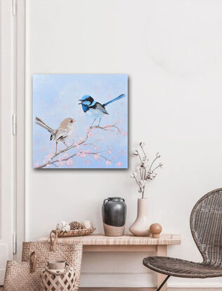 Thickly textured painting of a pair of singing Superb Fairy Wrens. One, a brown female and the other a brilliant blue male. They are perched on a pink blossom tree branch.