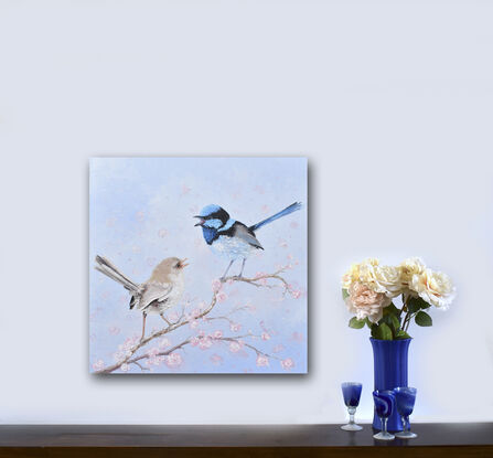 Thickly textured painting of a pair of singing Superb Fairy Wrens. One, a brown female and the other a brilliant blue male. They are perched on a pink blossom tree branch.