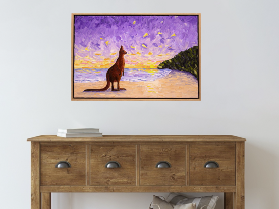 This is a colourful, textured oil painting of an Australian kangaroo, standing on the beach, watching the sunset.