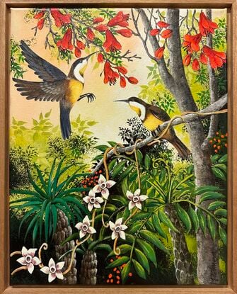 Two Honey Eaters are feeding in a red flowering tree. There is lots of green foliage against a soft golden sky