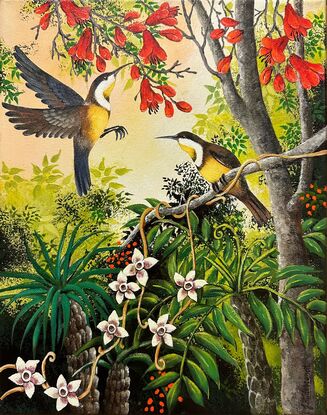 Two Honey Eaters are feeding in a red flowering tree. There is lots of green foliage against a soft golden sky