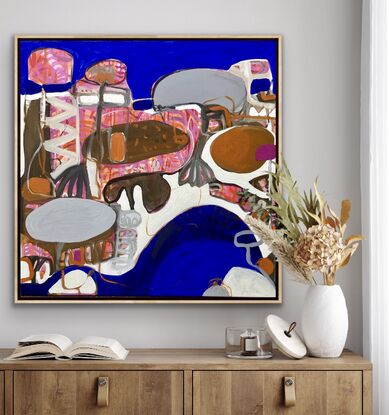 Large shapes in blue, white, brown and a touch of pink bringing an abstract scene into formation 