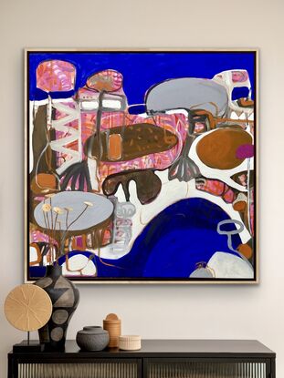 Large shapes in blue, white, brown and a touch of pink bringing an abstract scene into formation 