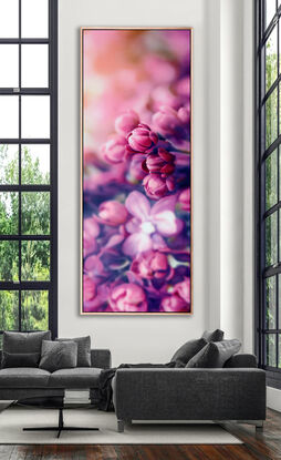 a very large bold painting of bright pink lillacs. Only a few buds are in focus with the rest of the floral bunch and background out of focus. deep pink, purple/lavendar shadows create a strong contrast. Has impact both horizontally and vertically.