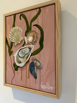 A modern painting of shellfish  ; scallops, muscles and oysters set in front of a luminous green floating seaweed. The background is a soft salmon pink. This is  inspired by Summer nights spent at our beach shack. Indulging in the taste of the ocean. 