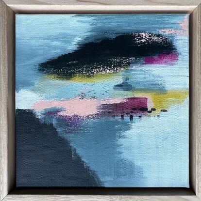 moody blue seascape with highlights of magenta