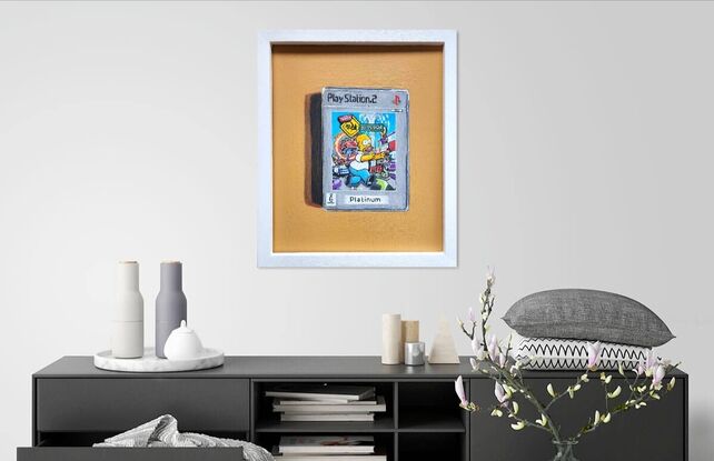 Still life painting of PS2 The Simpsons video game