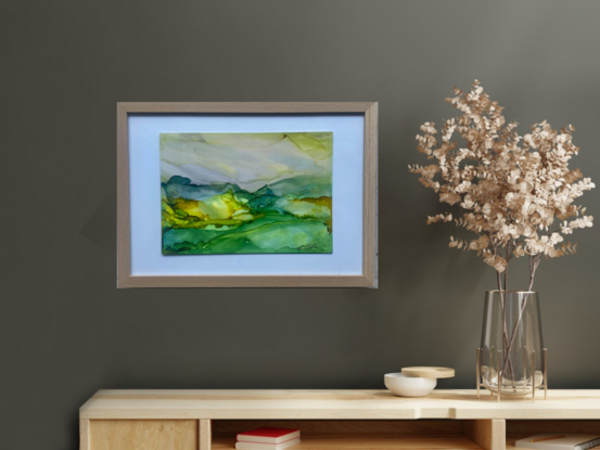 A small framed artwork in the abstract expressive style evoking the colours of Regional Australia. Painted in ink on Yupo paper