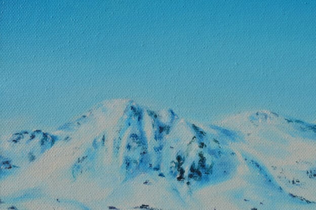 Snowy mountains with blue sky