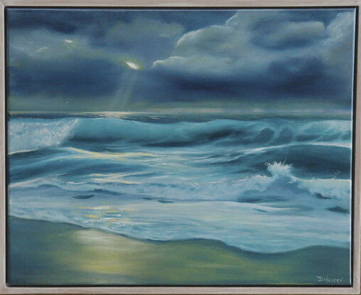 blue ocean waves under stormy sky with sun peeking through clouds