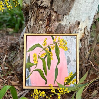 A colourful happy painting of wattle hanging over collaged gum and a pink background. Lots of pops of yellow to brighten up your day. 