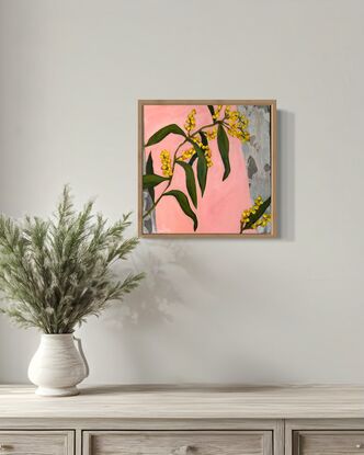 A colourful happy painting of wattle hanging over collaged gum and a pink background. Lots of pops of yellow to brighten up your day. 