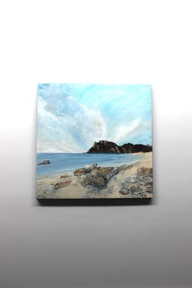 Majestic painting of a beach with a calm bay and a mountainous backdrop and awesome sky