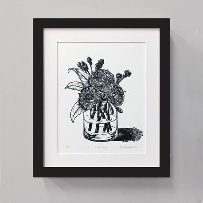 Black and white gum flowers in vase