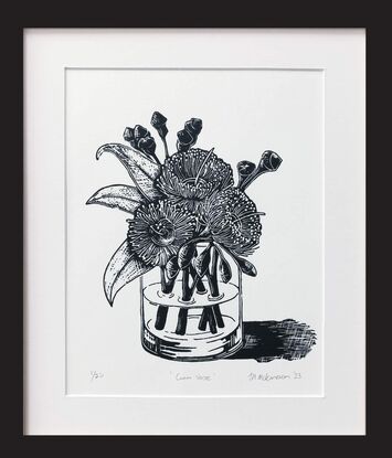 Black and white gum flowers in vase