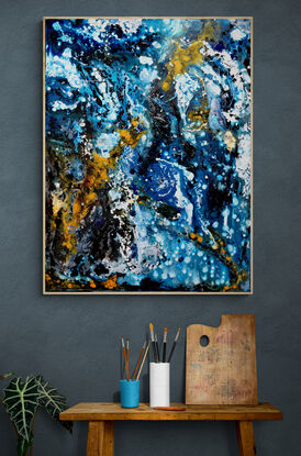 swirling flow of orange and white over deep blue hues creating abstract image of light and water