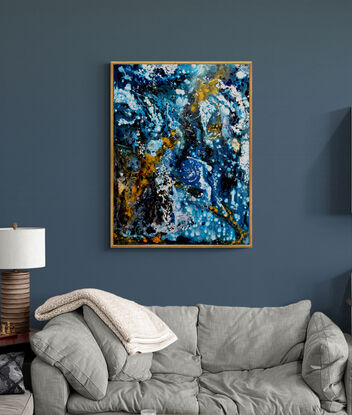 swirling flow of orange and white over deep blue hues creating abstract image of light and water